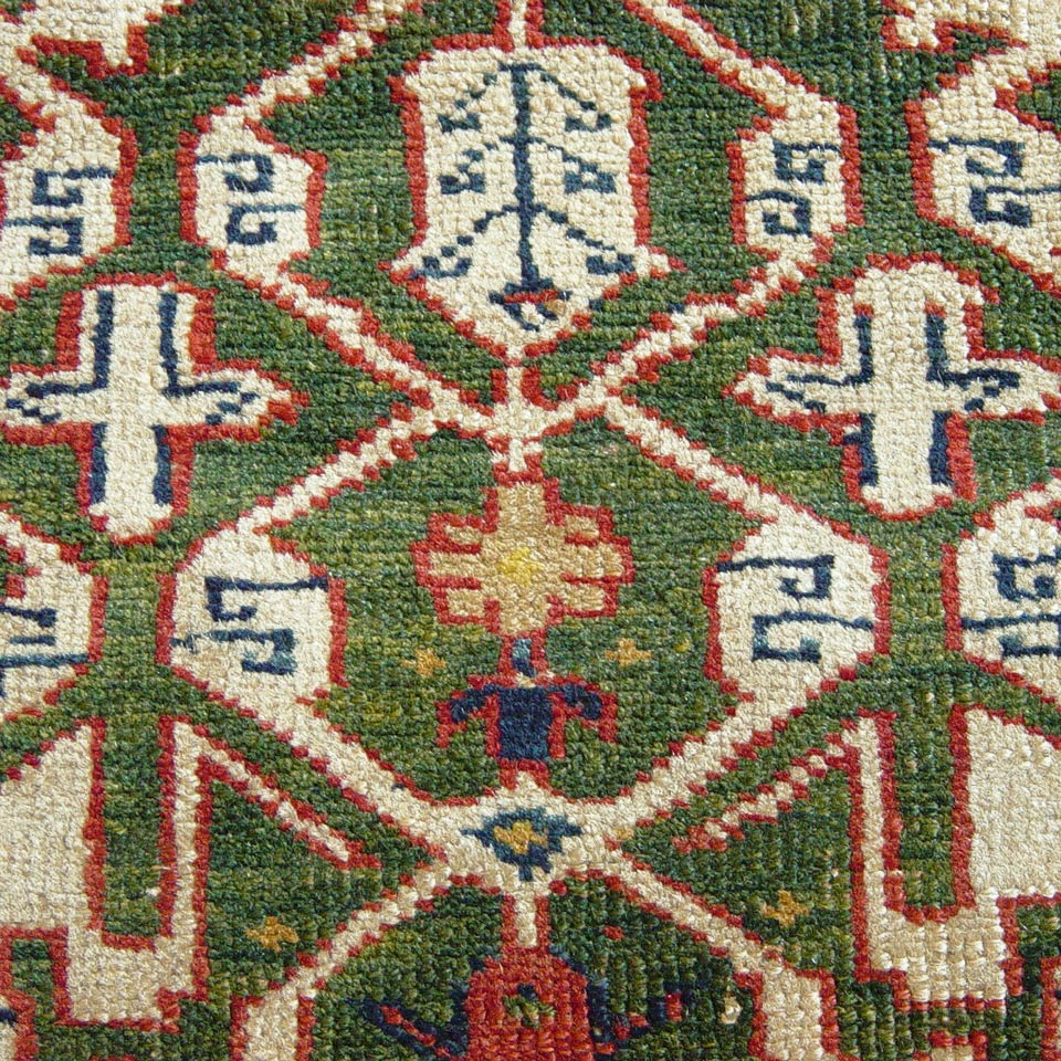 image Raro tappeto Kuba Konagkend a fondo verde